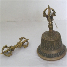 Picture of Fine Quality Tibetan Buddhist Temple Bell and Dorje (Vajra) Set made around the monastries of Nepal. The Dorje measures 10.5 cm (4.25 ") long and 4 cm (1.5") in diameter. The Bell measures 16 cm 6.25")